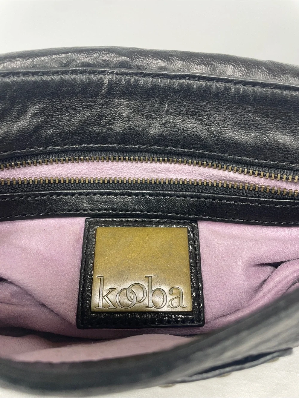 Kooba Black Leather Studded Wristlet Clutch with Brass Accents